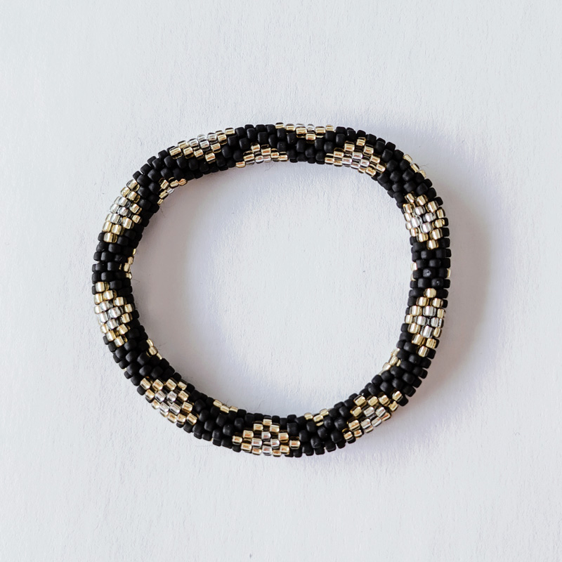 Bracelet népalais noir et doré - Maia et Zoé